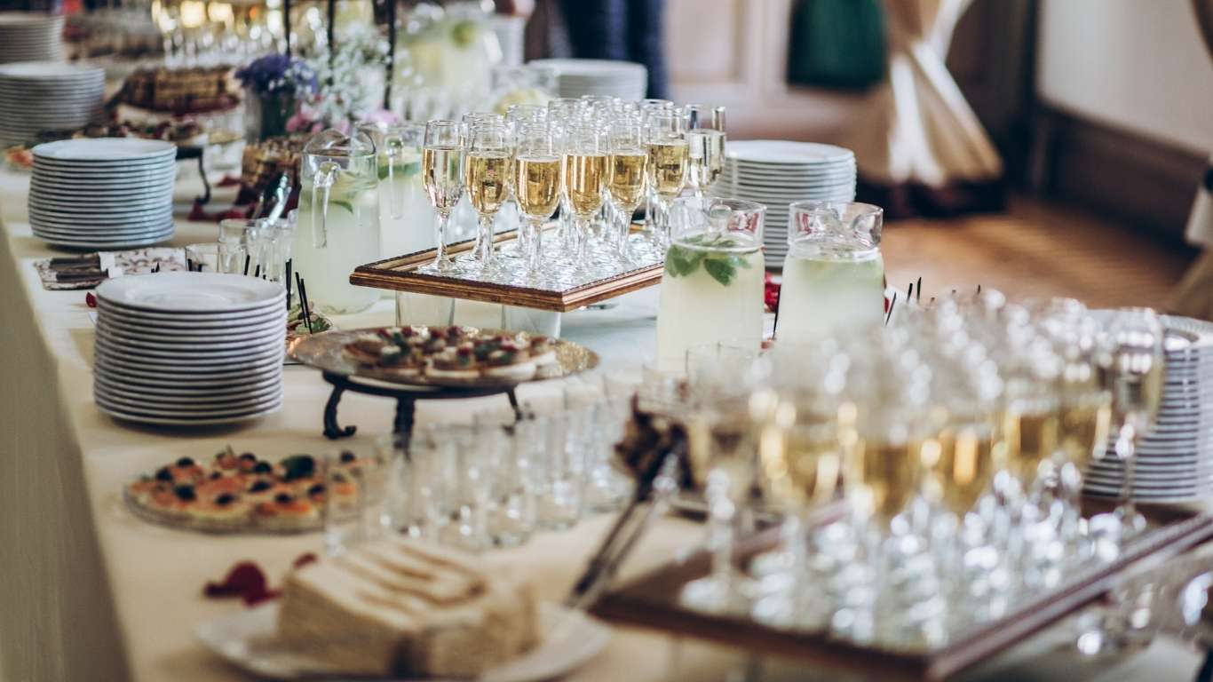 Elegant wedding reception setup with beautifully decorated tables and ambient lighting